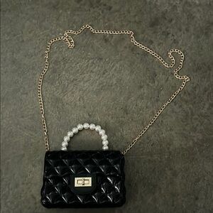 Black Quilted Handbag with Pearl Handle